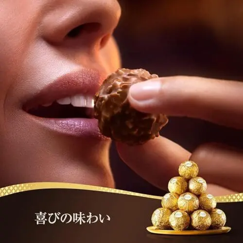 eating expression of ferrero rocher chocolates